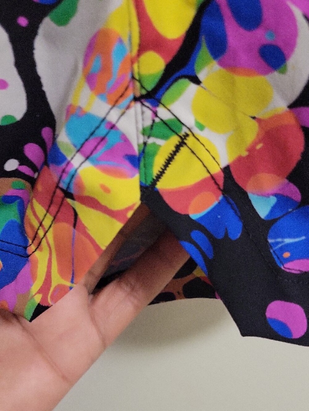 Fabletics Multicolor Splash Print Athletic Shorts - Black Base with Neon Accents - Picture 3 of 4